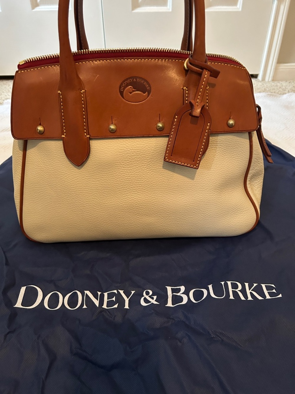Dooney & Bourke Cream Leather Satchel with Brown Trim and Handles